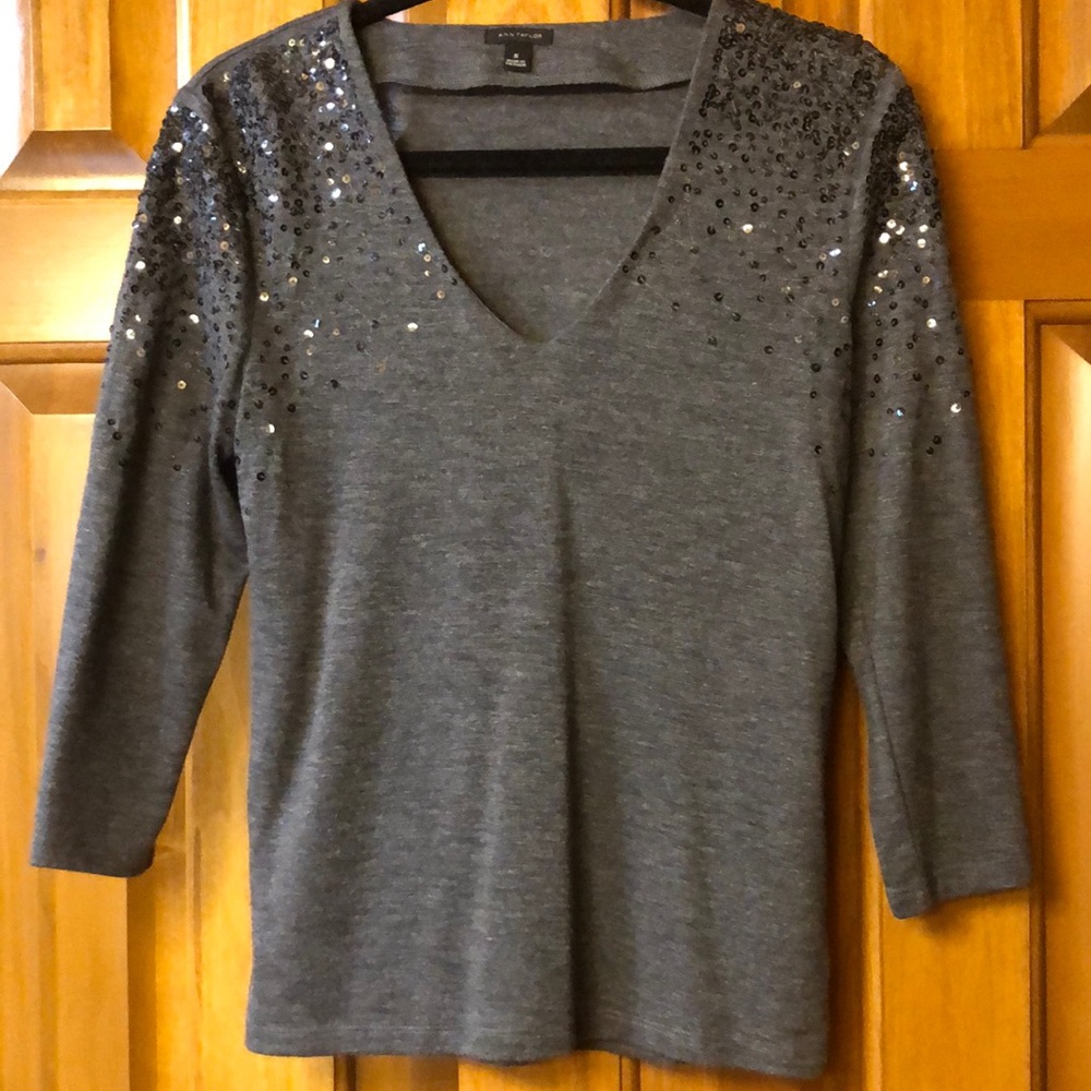 Whimsical gray Ann Taylor Top with dark gray sequences.